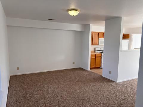 Living room with doorway to kitchen